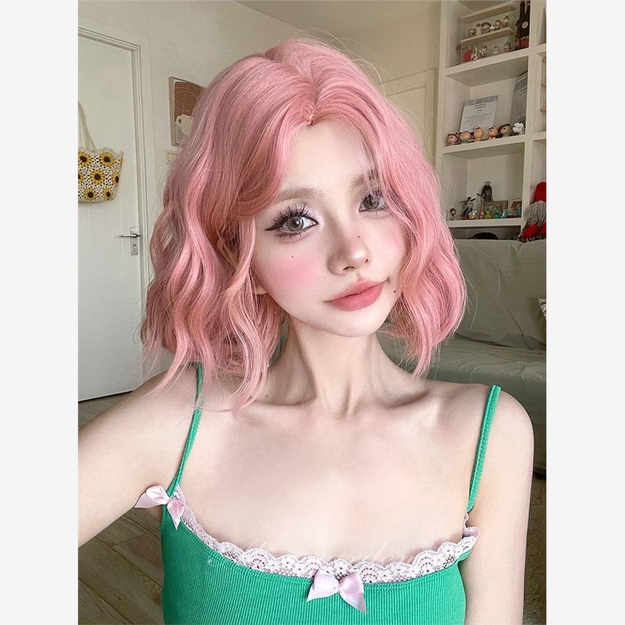 Short hair with a center parting and pink lolita curls