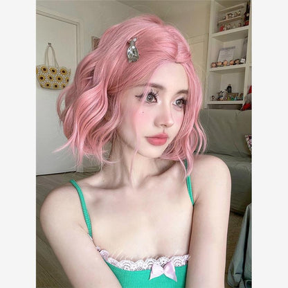 Short hair with a center parting and pink lolita curls